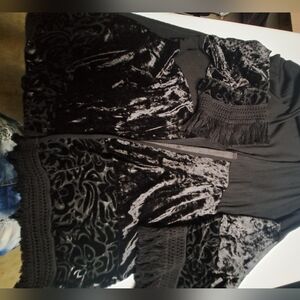 Beach blouse. It's new. Size L, color Negro